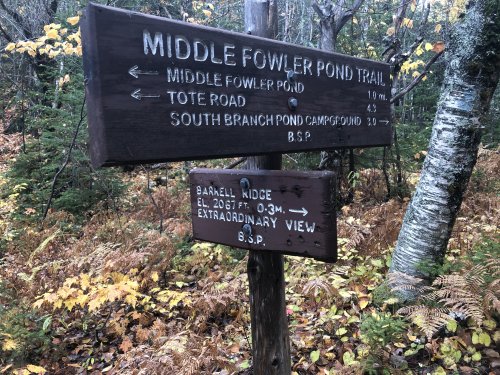 Trail signs, with delightful editorial