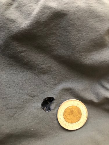 This larger hole in my wife's pants needed a second patch on the inside to reinforce the repair and to keep the adhesive away from her skin and socks.