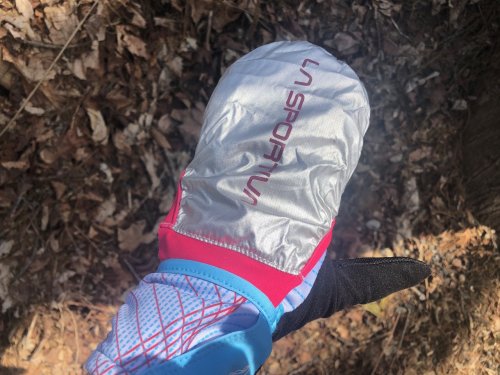 Weatherproof over-glove, folds into its own pocket